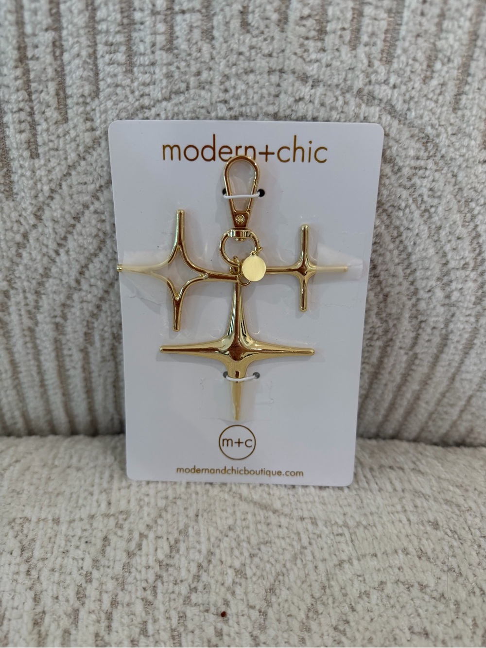Modern+Chic Gold Starburst Bag Charm Keychain